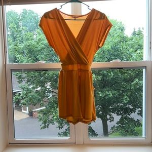 Yellow romper, never worn. Size M. Great fabric, heavy but breathable. ✨